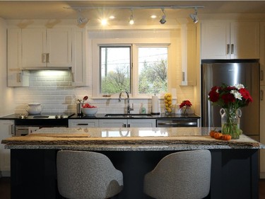 A kitchen vignette in the sales office gives an idea of what will be offered in the condos, including granite countertops and contemporary cabinetry.