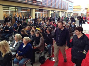 Crowds wait at the opening ceremony of the new Tanger Outlets in Kanata for Shopper Services.