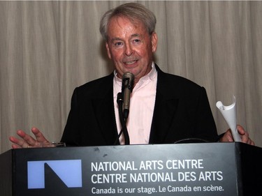 David Currie, conductor and music director of the Ottawa Symphony Orchestra, addresses reception guests after the orchestra's season-opening concert on Monday, Oct. 6, 2014, at the National Arts Centre.