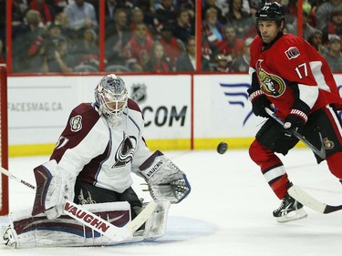 David Legwand looks for a rebound as the puck sails towards Calvin Pickard, left, in the third period.