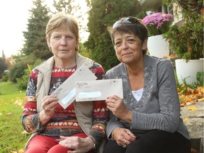 Donna Robillard, left, and Diane Matte both received voter cards for people who have not been with them for years.