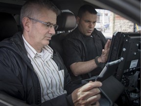 Dr. Peter Boyles, an emergency psychiatrist at The Ottawa Hospital, goes on the road with Cst. Stephane Quesnel, of the Ottawa Police Mental Health Unit. They respond together to some of the many police calls that involve people suffering a mental health crisis.  (Photo courtesy of Ottawa Police Service)