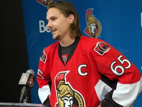 Erik Karlsson is all smiles as he talks to the media following the Ottawa Senators announcment of the signing of Bobby Ryan for an additional seven years and that Erik Karlsson has become the ninth captain in franchise history. (Wayne Cuddington/Ottawa Citizen)
