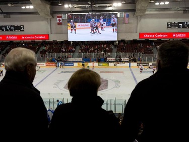 Fans check out the giant screen as the Ottawa 67's held their home opener in the renovated TD Place arena.