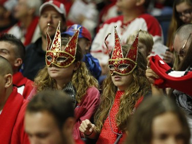 Fans wearing masks during the first period.