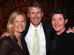 From left, committee member Velma McColl, Atlantic Salmon Federation president Bill Taylor and committee member Fiona Gilfillan at the 18th annual Fall Run Dinner held at the Canadian Museum of History on Wednesday, Oct. 8, 2014.