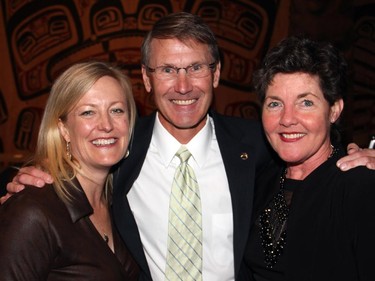 From left, committee member Velma McColl, Atlantic Salmon Federation president Bill Taylor and committee member Fiona Gilfillan at the 18th annual Fall Run Dinner held at the Canadian Museum of History on Wednesday, Oct. 8, 2014.