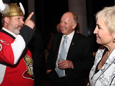 From left, Dan Greenberg with Nova Scotia Liberal MP Mark Eyking and Greenberg's wife, Barbara Crook, at the Fall Run Dinner for the Atlantic Salmon Federation, held Wednesday, Oct. 8, 2014, at the Canadian Museum of History.