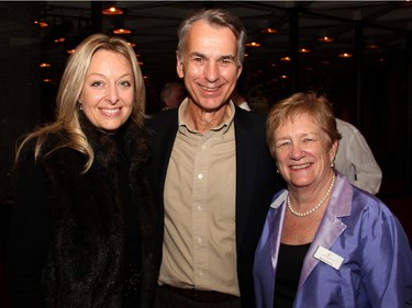 From left, Jennifer Currie with John Gomez, former concertmaster with the Ottawa Symphony Orchestra, and the OSO's board president, Martha Hynna, at the orchestra's Fanfare post-concert reception held Monday, Oct. 6, 2014, at the National Arts Centre.