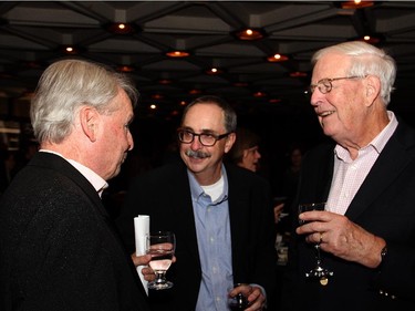 From left, Ottawa Symphony Orchestra conductor and music director David Currie chats with François Gauthier and Jim Nininger at the orchestra's Fanfare post-concert reception held Monday, Oct. 6, 2014.