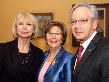 From left, University of Ottawa professor Ruby Heap with well-known Ottawa pianist Evelyn Greenberg and Gilles Patry, former president of UofO, at a reception held Wednesday, Oct. 8, 2014, at Earnscliffe in honour of the National Arts Centre Orchestra's tour to the UK.