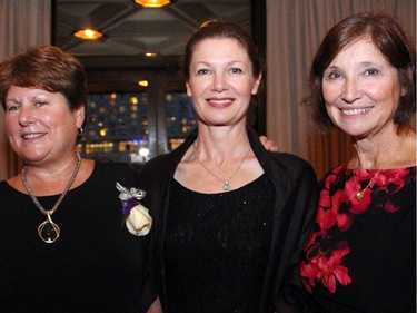 From left, Upstream Ottawa board president Lynda Lennox with Laura Hope and Ruth Maxwell at Upstream Ottawa's Youth Matters Gala, held Thursday, Oct. 16, 2014, at the National Arts Centre. (