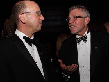 From left, Victor Dodig, president and CEO of presenting sponsor CIBC, in conversation with CIBC executive David McGown at the NAC Gala held Thursday, Oct. 2, 2014, at the National Arts Centre.