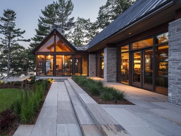 Entries include a mix of fresh faces and veterans such as architect Barry Hobin, who submitted this glass and stone cottage on the St. Lawrence River.