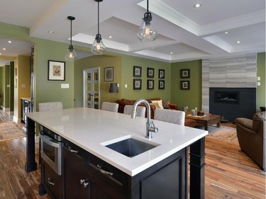 Amsted Design-Build and Chuck Mills Residential Design & Development won renovation $500,000 to $749,999 with the redesign, both inside and out, of a dated home.