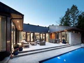 Architect Barry Hobin and Roca Homes used extensive glazing, limestone and a garden courtyard to connect a contemporary bungalow on a vacant lot with its natural surroundings. The home won custom urban infill, 2,401 to 3,099 sq. ft.