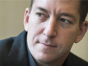 Journalist Glenn Greenwald poses for a photograph in Montreal, Thursday, October 23, 2014.