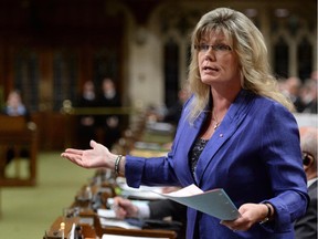 Minister of Canadian Heritage and Official Languages Shelly Glover responds to a question during question period in the House of Commons on Parliament Hill in Ottawa on Thursday, Oct. 9, 2014.