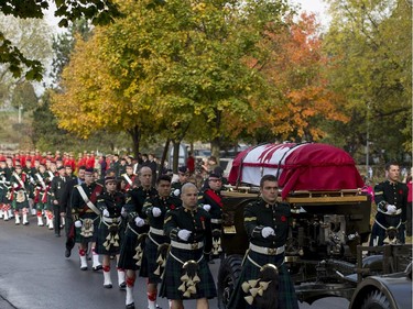 The casket makes its way through the streets during the funeral procession for Cpl. Nathan Cirillo in Hamilton.