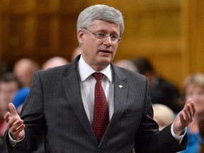 Prime Minister Stephen Harper responds to a question during Question Period in the House of Commons, Wednesday, Oct.1, 2014 in Ottawa.