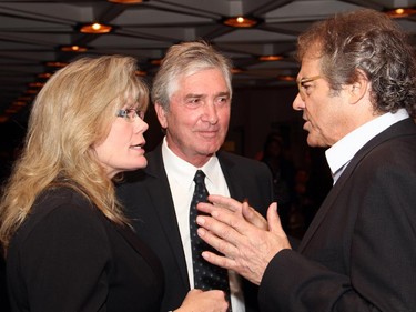 Heritage Minister Shelly Glover in conversation with Michel Roy, chair of the Telefilm Canada board, and film producer Richard Goudreau, right, at the Ottawa premiere of Elephant Song,  at the National Arts Centre on Monday, Sept. 29, 2014.