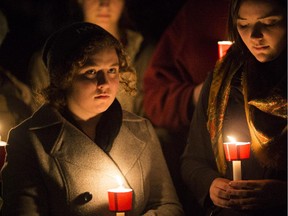 Hundreds gathered at the National War Memorial for a candlelight vigil in memory of Cpl Nathan Cirillo whom was killed earlier this week in Ottawa, October 25, 2014.    (Chris Roussakis/ Ottawa Citizen)