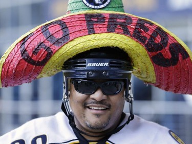 Ivan Santamaria arrives for the Nashville Predators opening night NHL hockey game against the Ottawa Senators.