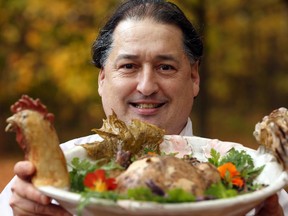 Jean-Claude Chatrand,  Chef and owner of L'Oree du Bois in Chelsea, prepares Beggar's Chicken, which cooks five hours inside a clay wrap and won a Quebec-wide contest.