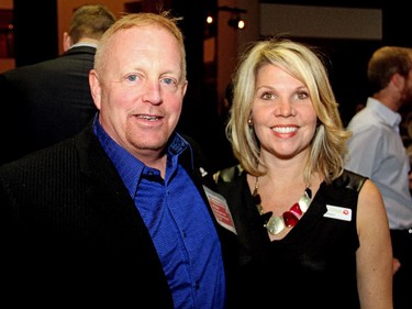 Jeff Hunt, president of Ottawa Sports and Entertainment Group, with United Way Ottawa community campaign manager Jessica Roback at Schmoozefest 2014