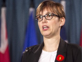 Jennifer Molson, who recovered fully from multiple sclerosis as a result of a stem cell bone marrow transplant, speaks during at press conference on Parliament Hill to launch an action plan aimed at reducing suffering through stem cell therapy.