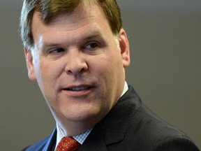 Minister of Foreign Affairs John Baird takes part in a press conference in Ottawa on Tuesday, September 30, 2014.