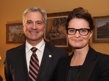 John Bragg, V-P of government and regulatory affairs at Aimia, with Jane Moore, chief advancement officer with the NAC Foundation, at a reception held Wednesday, Oct. 8, 2014, at Earnscliffe in honour of the National Arts Centre Orchestra's tour to the UK.