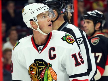 Jonathan Toews of the Chicago Blackhawks looks up at the clock during overtime NHL action.