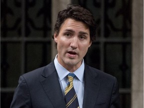 Liberal leader Justin Trudeau speaks on the government's motion on a combat mission in Iraq following Question Period in the House of Commons Friday October 3, 2014 in Ottawa.