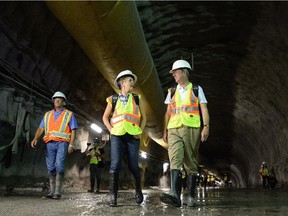 Ontario Premier Kathleen Wynne and Ottawa Mayor Jim Watson tour the Confederation Line light rail transit tunnel in downtown Ottawa on Monday, Aug. 11, 2014.