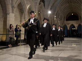 Speaker of the House of Commons Andrew Scheer follows Sergeant-at-Arms Kevin Vickers through the Hall of Honour during the Speakers parade in the House of Commons Thursday October 23, 2014 in Ottawa.