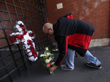Ed Hughes a Hamilton veteran lays a  wreath at  the gate of the  John Weir Foote  armoury in Hamilton. The soldier who was killed at the War Memorial in Ottawa was from the Argyll and Sutherland Highlanders of Canada based out out of the Hamilton armoury.