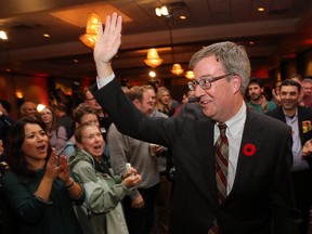 Mayor Jim Watson after being re-elected greets supporters  at the Hellenic Community Centre as elections were held across Ontario for the various municipalities including Ottawa.  Assignment - 118787  // Photo taken at 20:41 on October 27, 2014. (Wayne Cuddington/Ottawa Citizen)