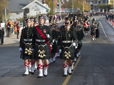 Members of the Argyll and Sutherland Highlanders Regiment march during the funeral procession of Cpl. Nathan Cirillo.