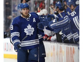 TORONTO, ON - MARCH 22:  Joffrey Lupul #19 of the Toronto Maple Leafs celebrates a goal against the Montreal Canadiens during an NHL game at the Air Canada Centre on March 22, 2014 in Toronto, Ontario, Canada. (Photo by Claus Andersen/Getty Images)