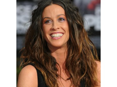 Musician Alanis Morissette poses on the red carpet as she arrives for the premiere of  "Prince of Persia: The Sands of Time" at Grauman's Chinese Theater in Hollywood on April 17, 2010.