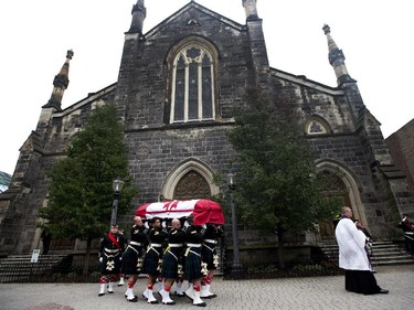 Pallbearers carry the casket of Cpl. Nathan Cirillo during his regimental funeral service in Hamilton.