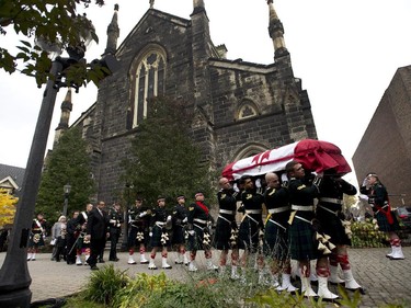 Pallbearers carry the coffin of Cpl. Nathan Cirillo during his regimental funeral service.