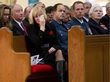 Laureen Harper cries while attending Cpl. Nathan Cirillo's regimental funeral service.