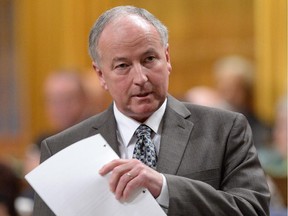 Defence Minister Rob Nicholson answers a question in the House of Commons, Tuesday, Sept. 16, 2014 in Ottawa.