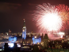 Canada Day fireworks on Parliament Hill in Ottawa on Monday, July 1, 2013. Amanda Watson and David Moscrop argue that Canada should not change its traditions or culture in response to Wednesday's attack.