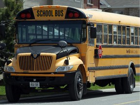 OTTAWA, ON. MAY 2014 --- STOCK PHOTO: School bus, parked outside Longfield's Davidson H.S. (Julie Oliver/Ottawa Citizen) #STK.