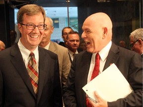 Jim Watson, left, and Larry O'Brien chat before the evening mayoral debate held at the Ottawa City Hall, September 13, 2010.