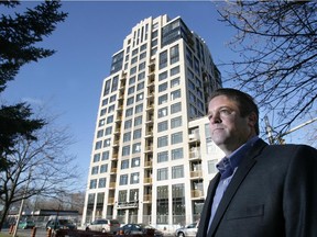 Peter Hume poses in front of a still under construction condo building at 793 Richmond Rd. at Cleary Ave. in Ottawa on Friday, November 12, 2010.