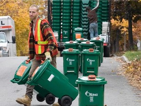 Back in 2009, Nick Leonard delivers green bins along Fairmont Ave as the City Of Ottawa's Green Bin Program for household organics such as potato peelings is rolled out across the region.